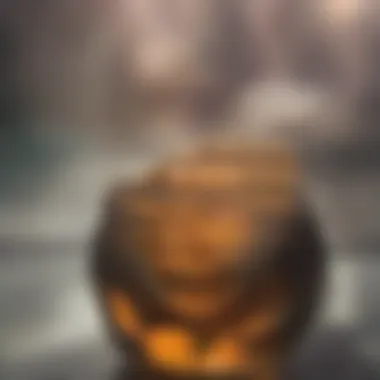 The Unique Texture of Manuka Honey A close-up view of Manuka honey in a glass jar, showcasing its thick consistency and golden hue.