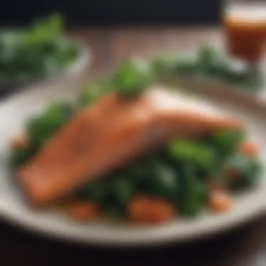 A plate featuring a delicious meal with salmon and leafy greens